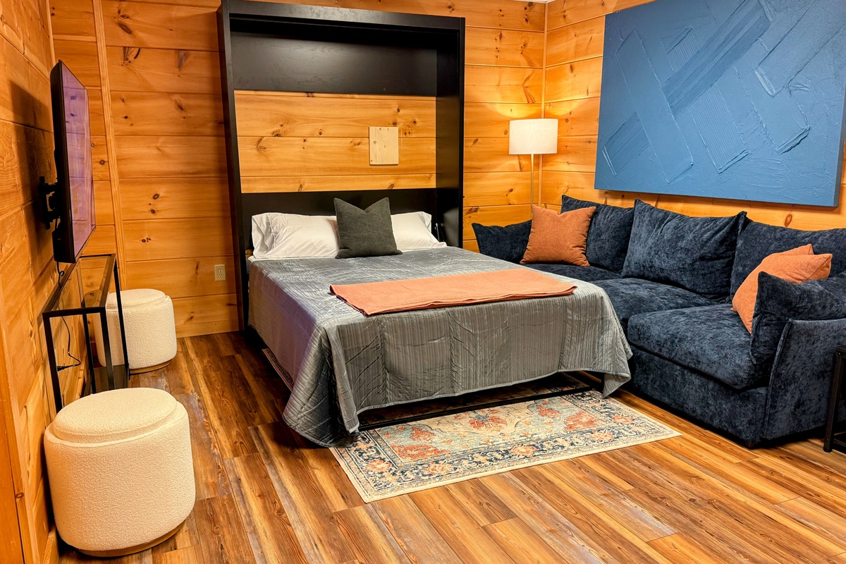 Effortlessly transform the living space into an additional bedroom with our convenient Murphy bed, which offers flexible sleeping arrangements for your group!