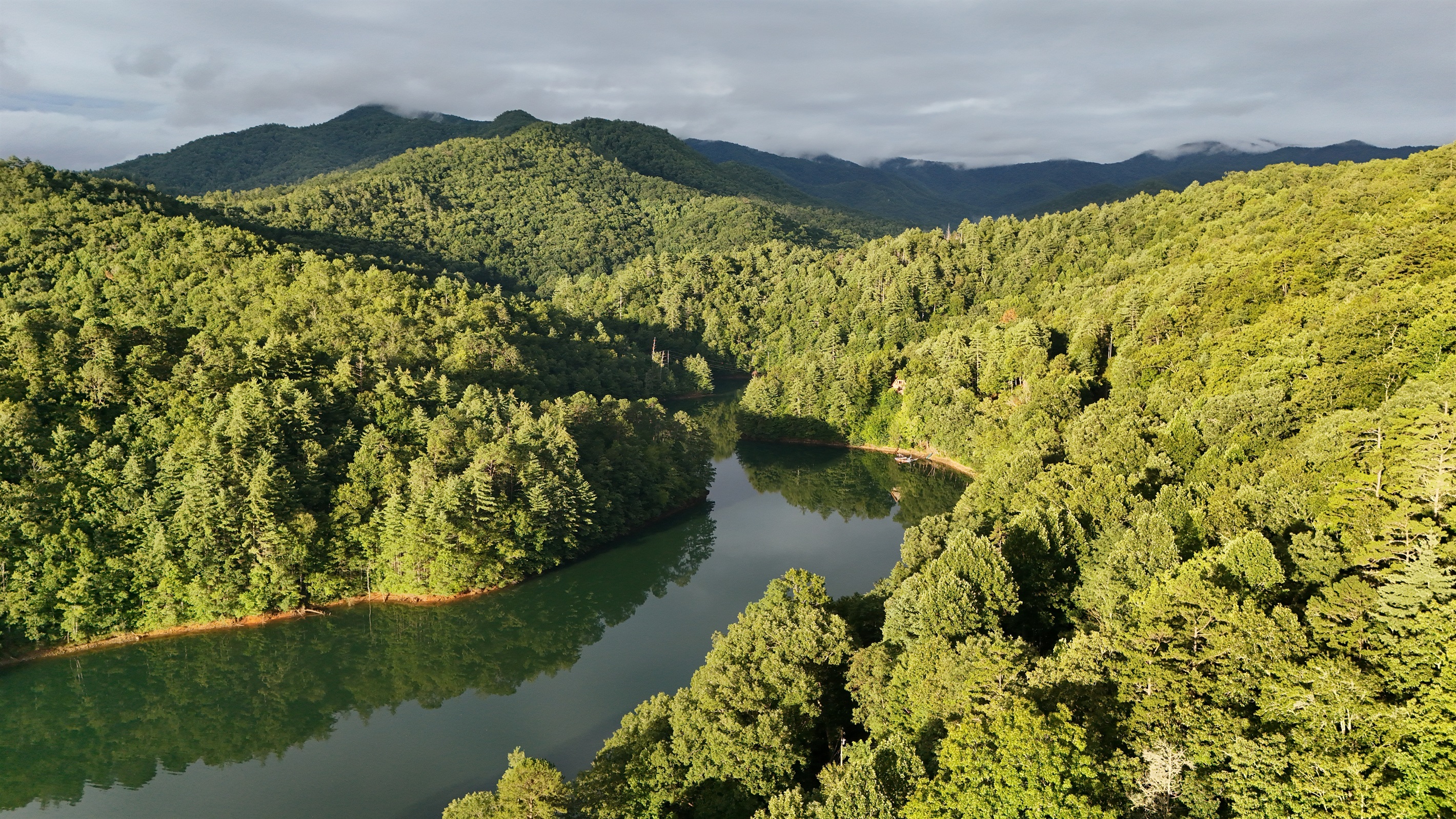 Mountain lake magic. Discover tranquility in this breathtaking natural setting.