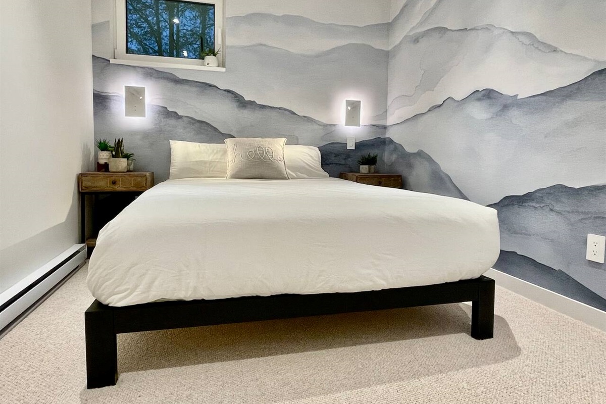 Bedroom #4 features signature designer touches including  mountain themed wall covering,  built in wall sconces w/telescopic privacy reading lamps and clever closet organizer w/integrated closet rail LED lighting 