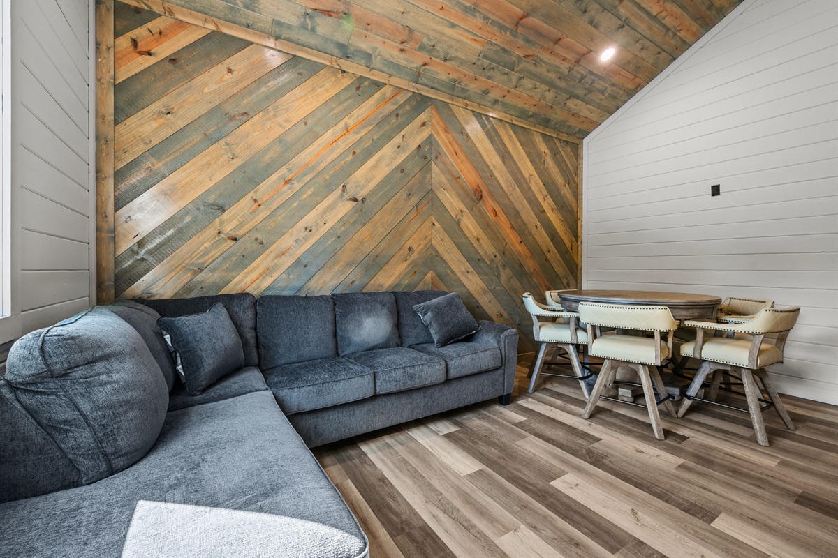 Comfortable seating and rustic textures make this a cozy spot to unwind after a full day of adventure.