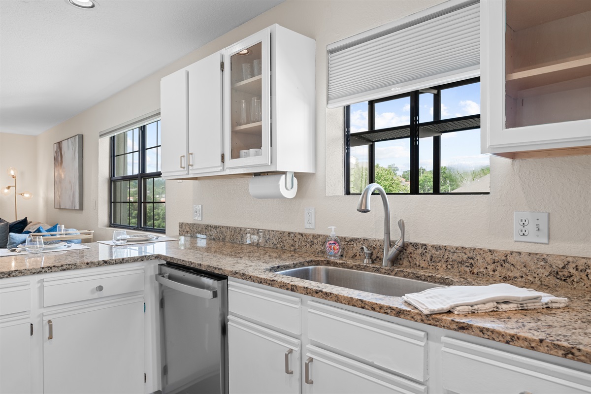 🧼 A closer look at the kitchen shows off its sleek design, abundant natural light, and thoughtful layout that makes it a joy to use.