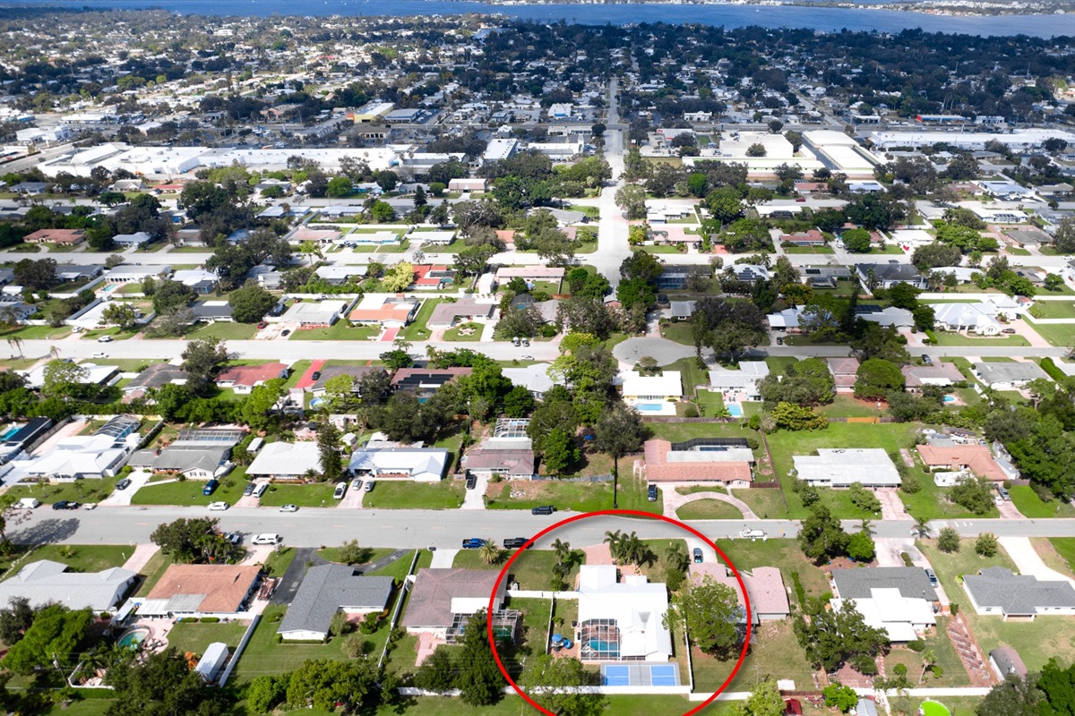 Take in the sweeping aerial view of your peaceful hideaway, just a short drive from the beach, and must-see attractions.