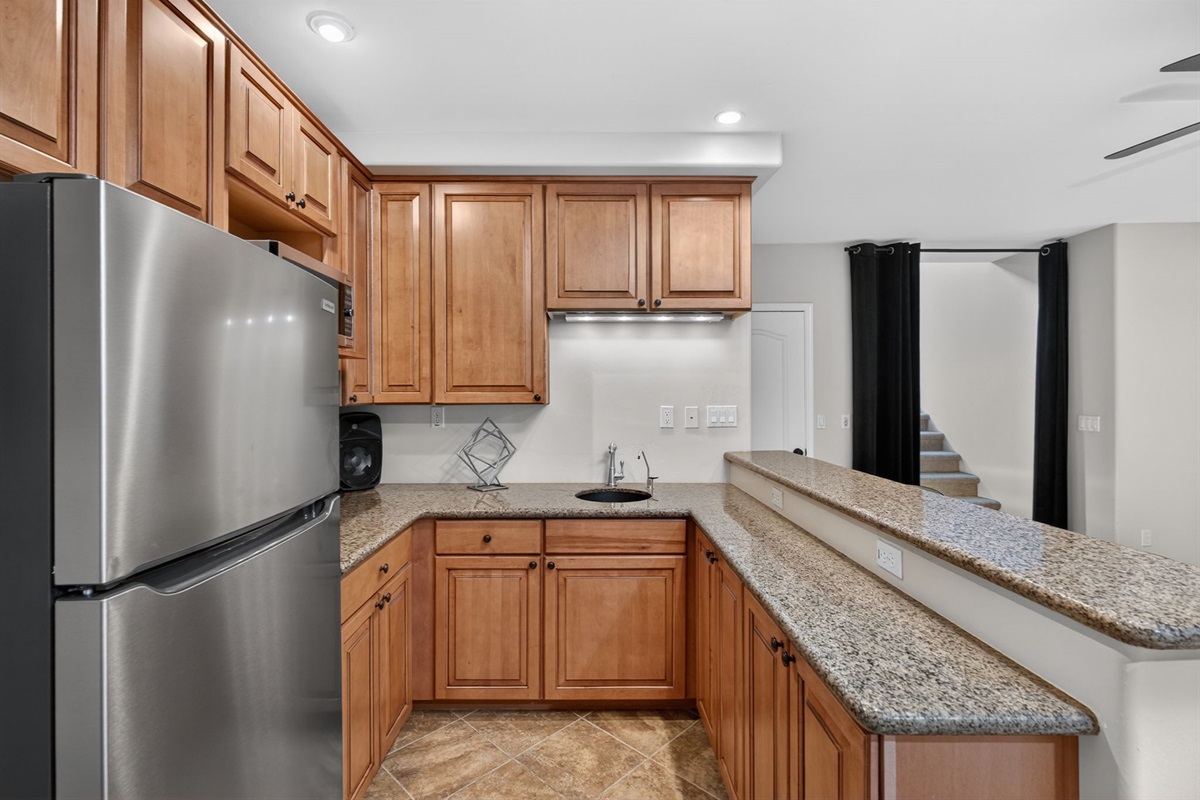 Basement dining area with seating creates a convenient second gathering space for meals and games