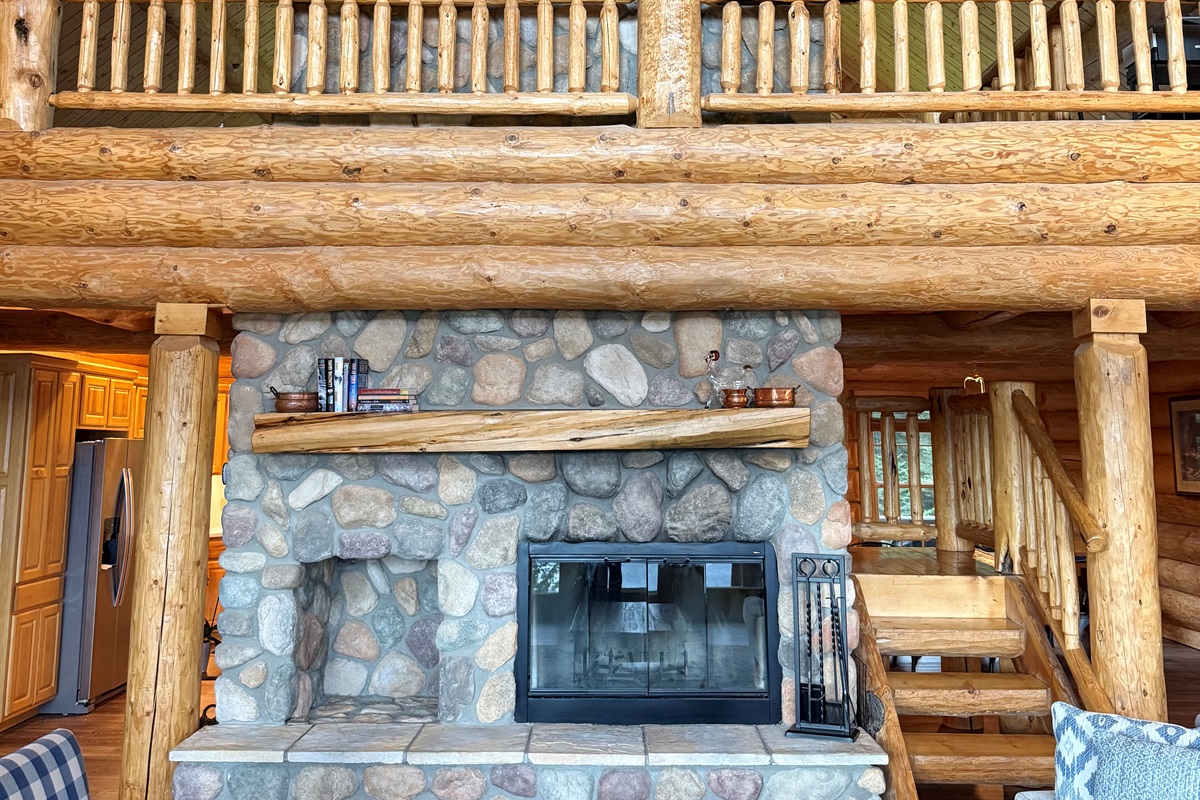 Stone fireplace in sitting area