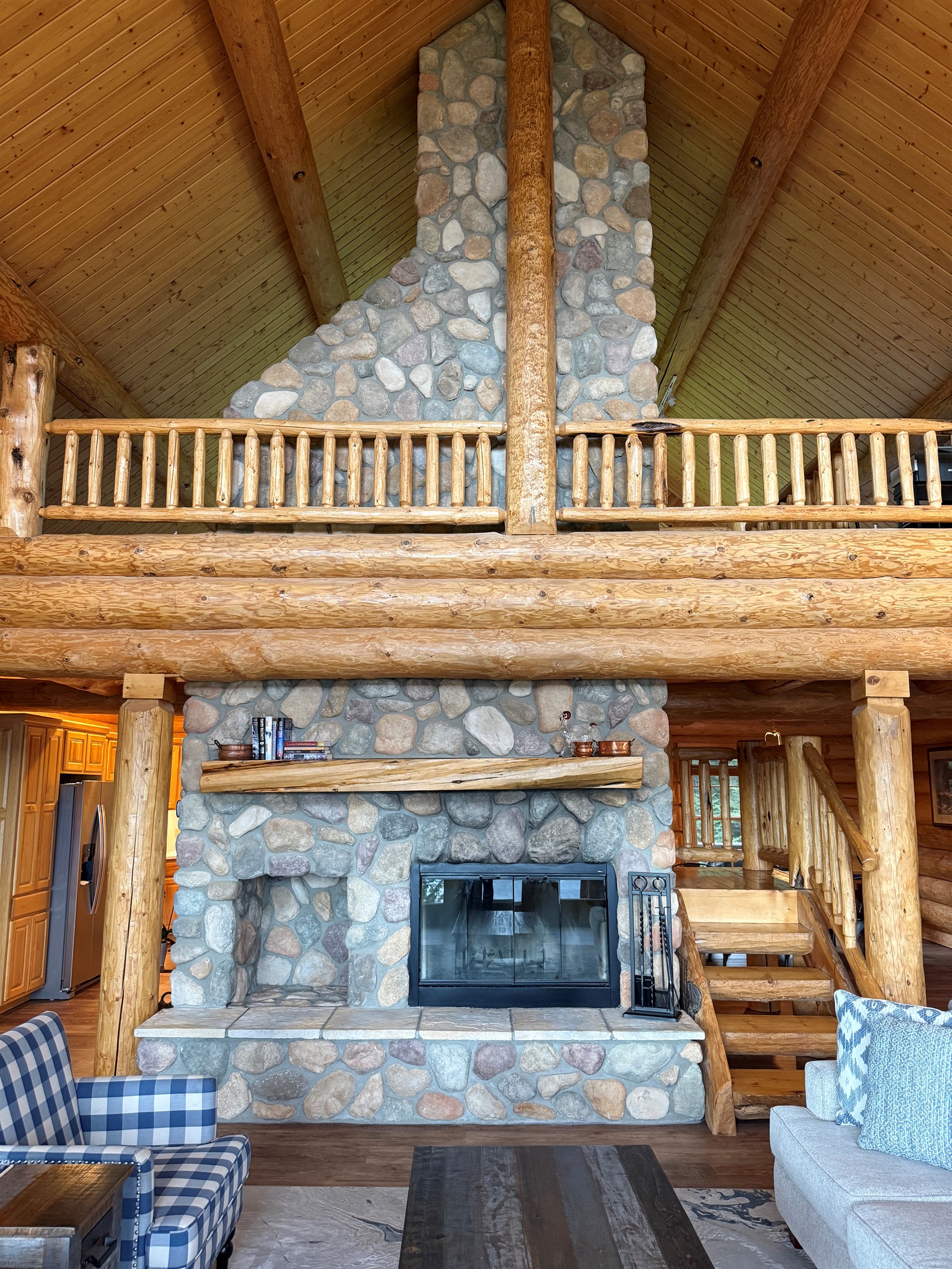 Stone fireplace in sitting area