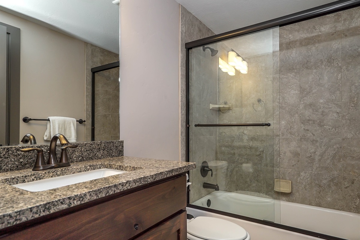 Full bathroom on the lower level for added convenience.