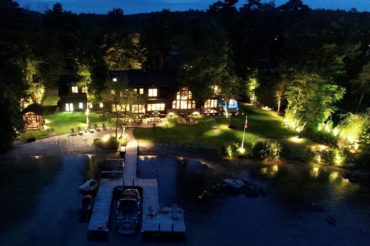 Lake Winnipesauke luxury lakefront home with walk in sandy beach and gorgeous mountain views!