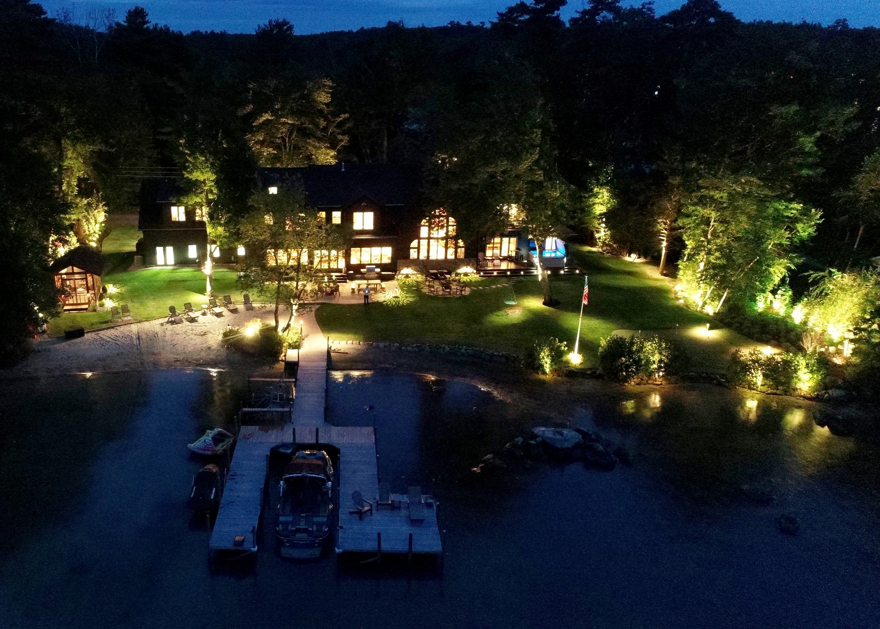 Lake Winnipesauke luxury lakefront home with walk in sandy beach and gorgeous mountain views!