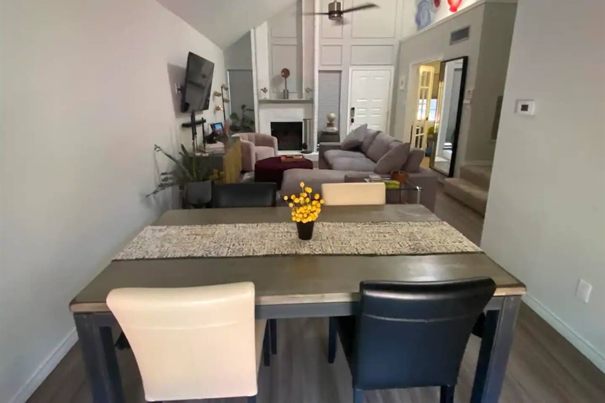 Dining area with seating for four and open layout to the living room