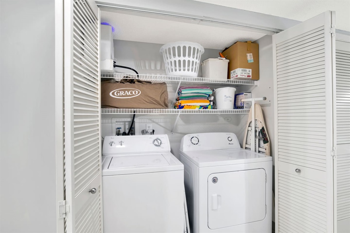 Standard-sized Washer + Dryer - 1 load Detergent provided! You'll also find the beach towels here above the dryer, as well as the pack 'n' play.