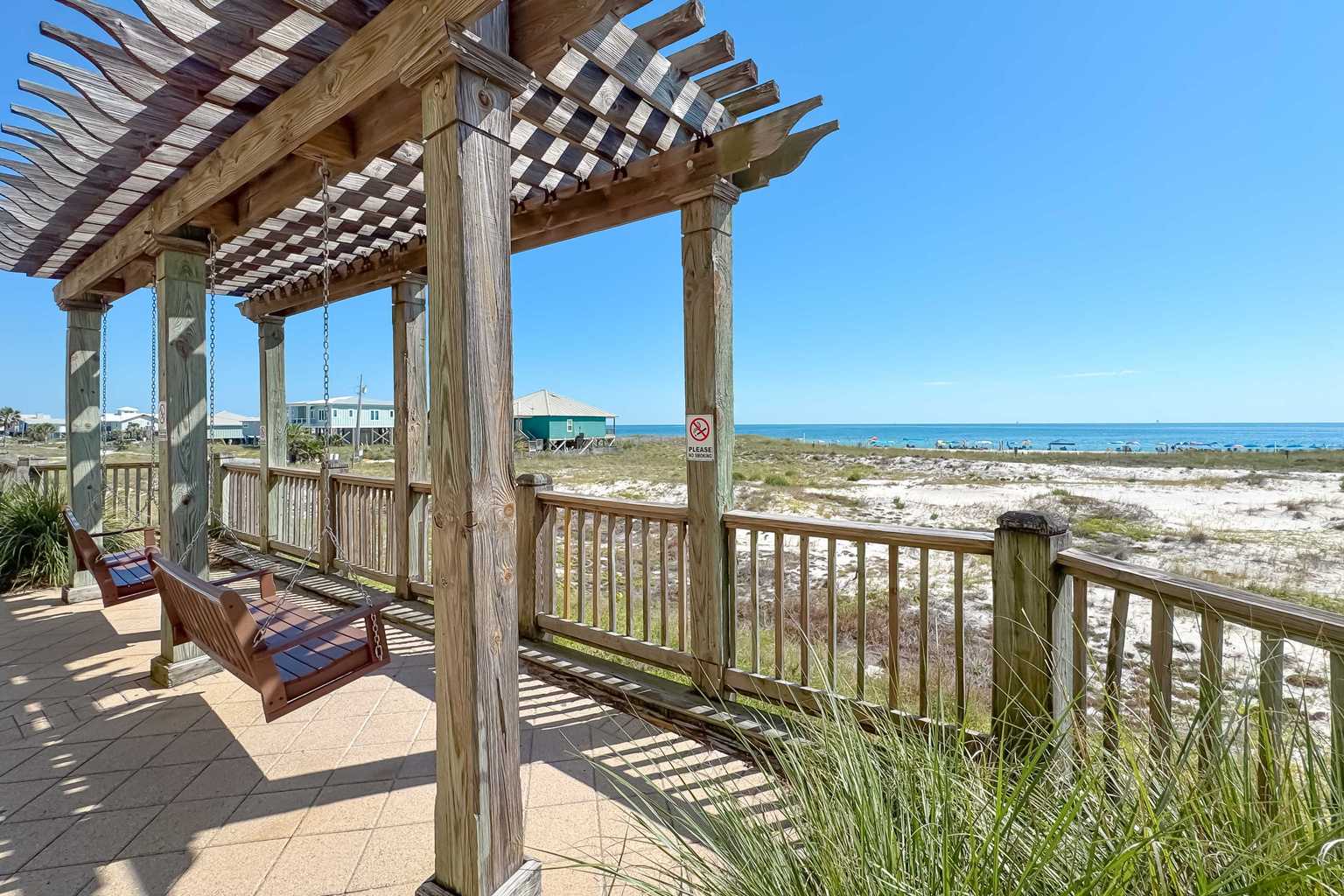 Elegantly designed for leisure. This shaded swing area offers the perfect blend of comfort and scenic beauty.