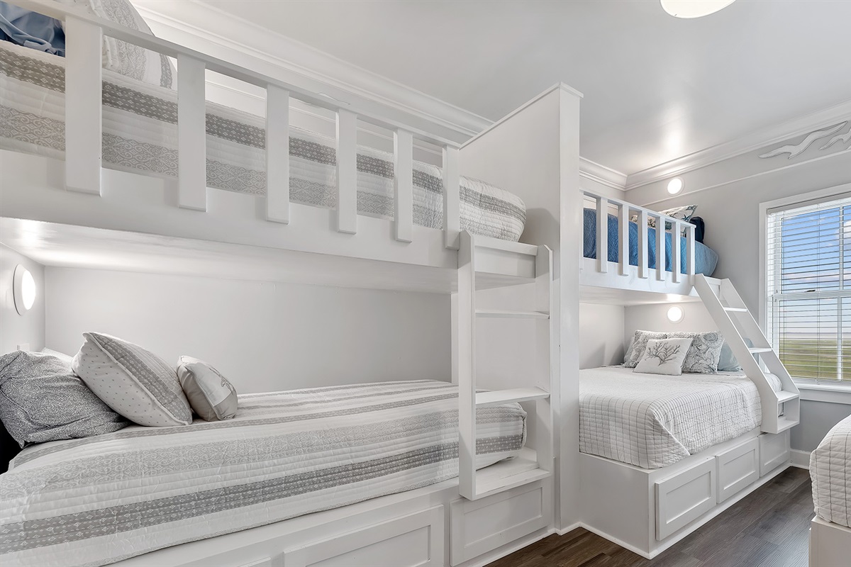 Bunk Room #1: Comfortably sleeps 6-8 guests, with drawers and closet for storage.