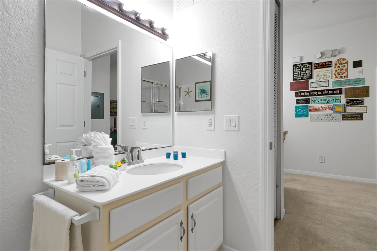 Guest queen bedroom bathroom with walk in shower