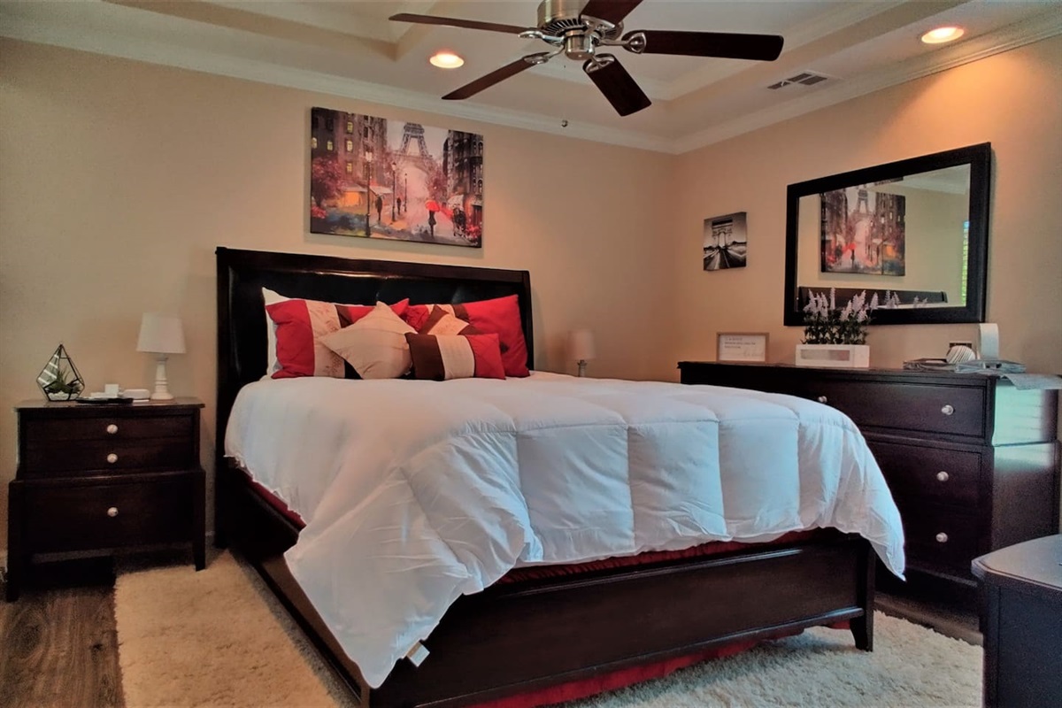 Enjoy a peaceful night's sleep in the plush queen bed with memory foam topper.