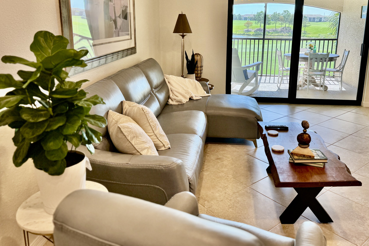 Living room overlooks the 9th fairway—golfers appreciate it, non-golfers enjoy the view and quiet.