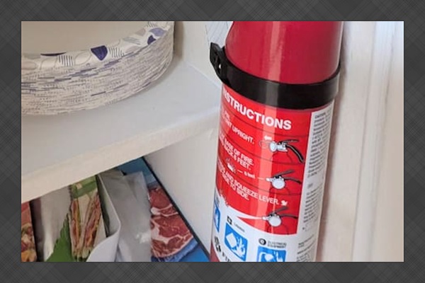 Fire extinguisher and first aid kit are conveniently located in the pantry. 