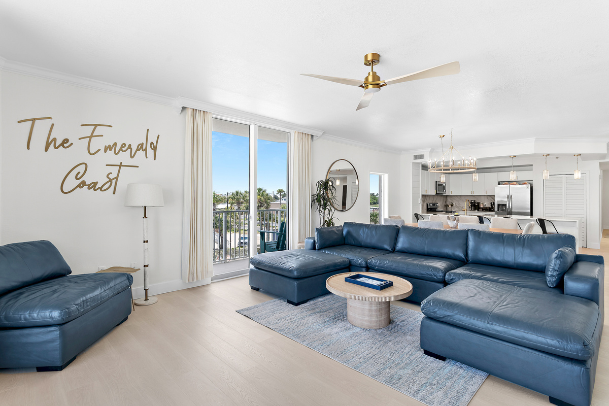 Large, Open Living Room with Gulf Views through Floor-to-Ceiling Sliding Doors - New Dining Table with Seating for 8