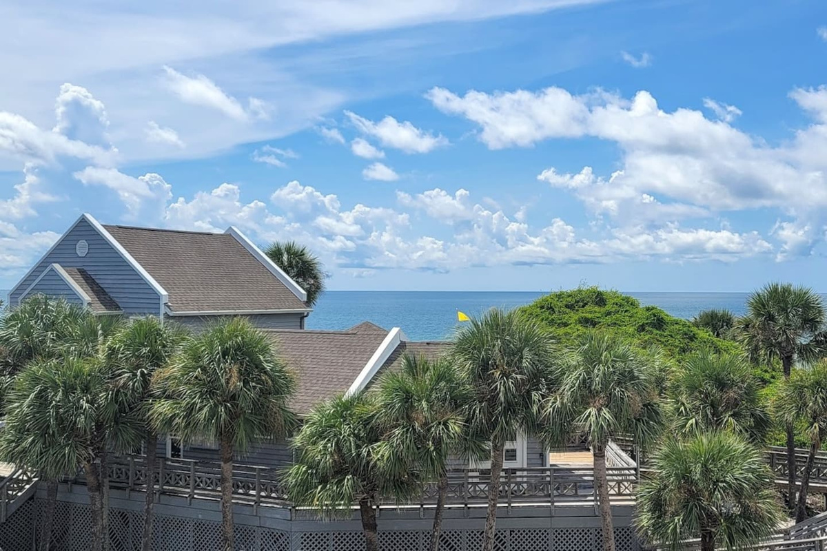 Step onto the master deck and see the Gulf and the clubhouse &mdash; this entire resort is yours for the week.