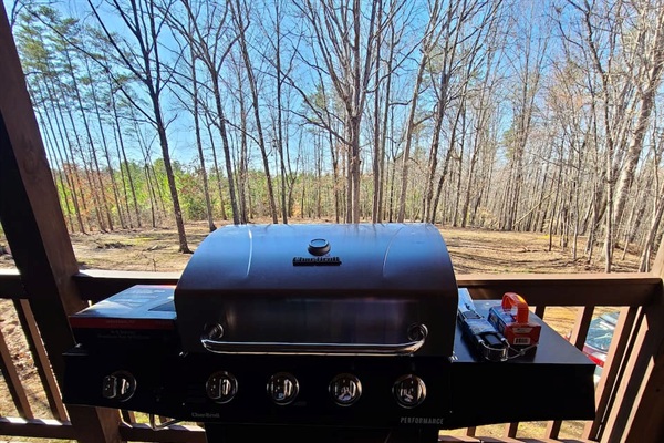 Grill Station: Sizzle under the sun with this premium barbecue setup and lovely wooded views!