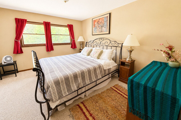 A spacious king bedroom designed for a restful night's sleep.