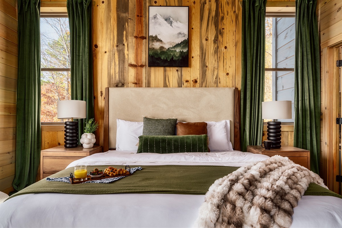 Another look at this serene bedroom. Bright, inviting, and uncluttered.