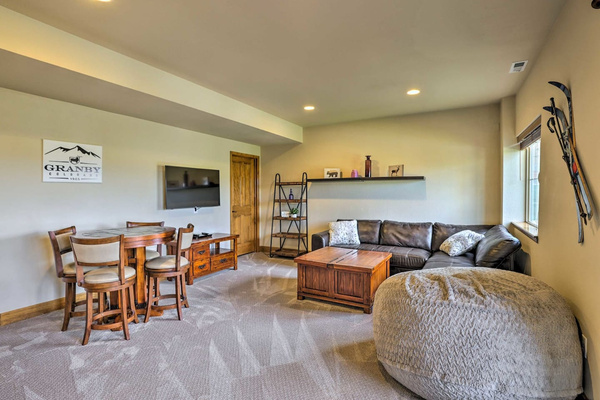 Downstairs Living Room and Game Table with Murphy Bed