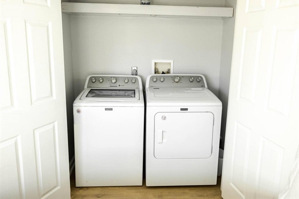 Enjoy the convenience of a full-size washer and dryer, perfect for extended stays or quick refreshes.