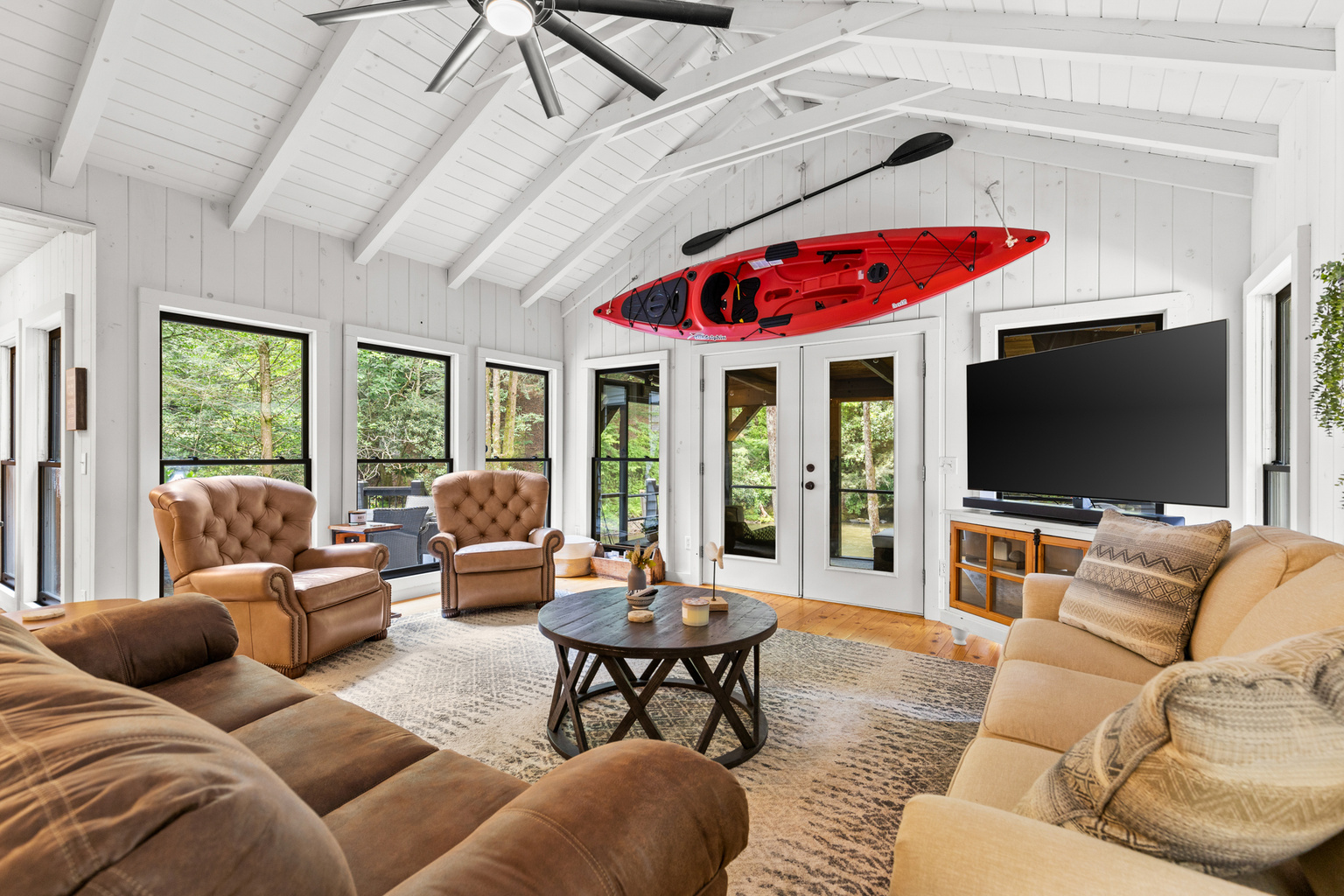 The bright, open living room is the perfect gathering place after a day of adventure.
