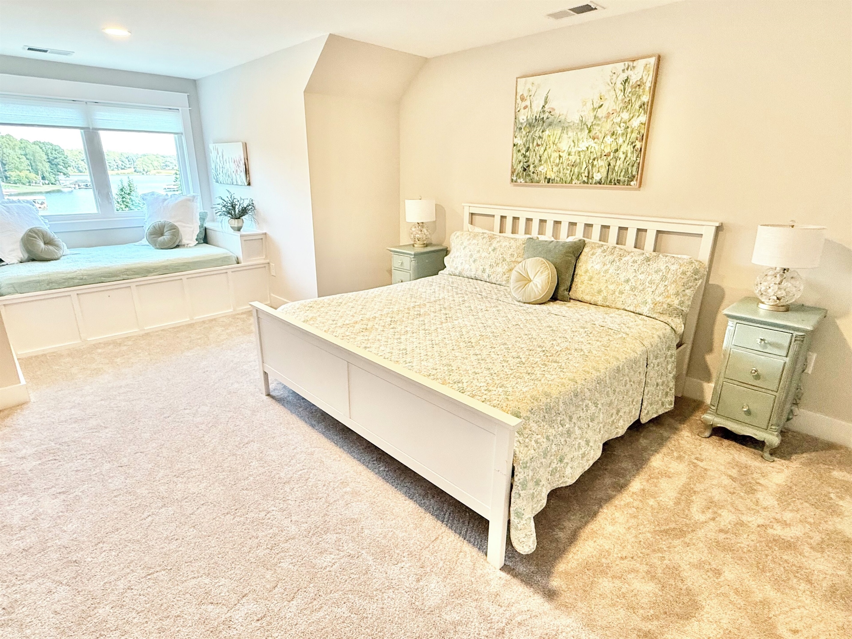 This king room is a show stopper! With an en-suite full size window bed, perfect for kids to sleep in the same room as their parents!  Amazing lake view, luxury bedding, antique furnishings! A dream bedroom, and a feather soft bed!