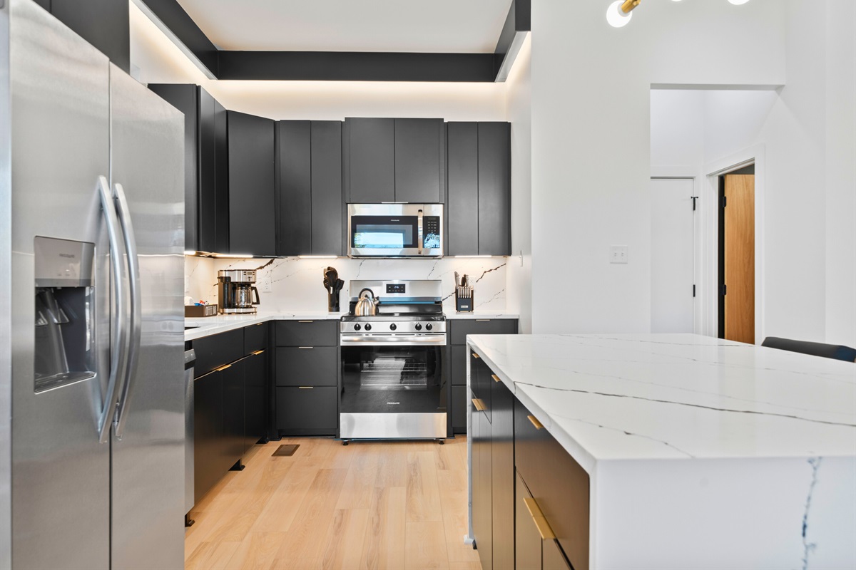 Generous counter space makes the kitchen functional without feeling crowded.