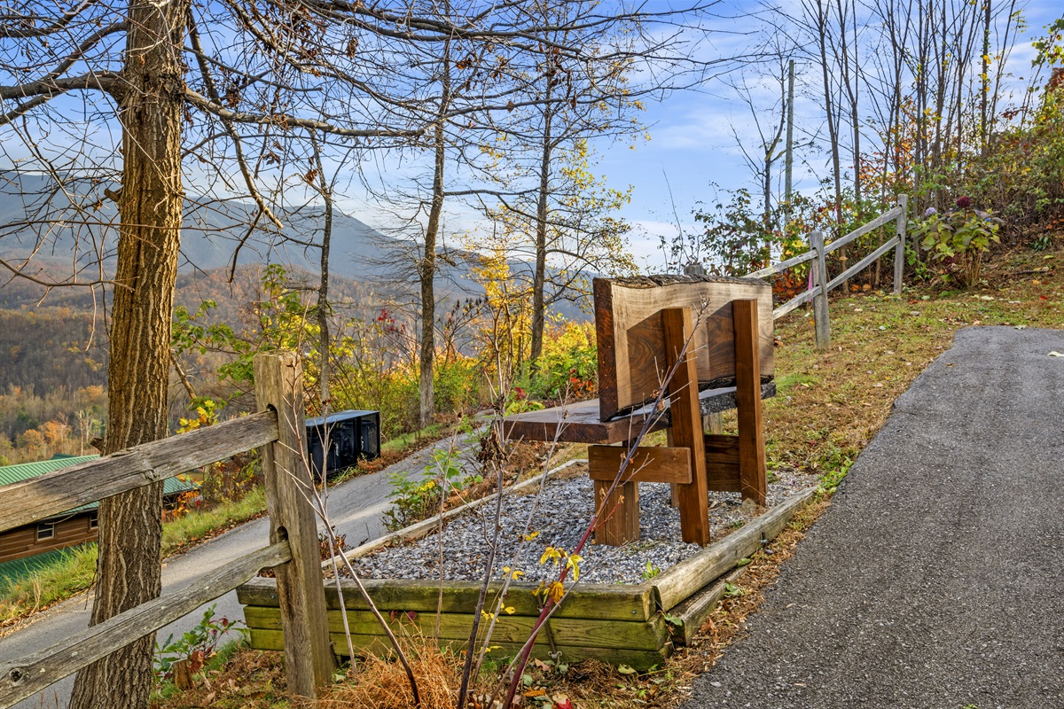 Sit back on the bench and soak in the peaceful mountain views for a moment of pure relaxation