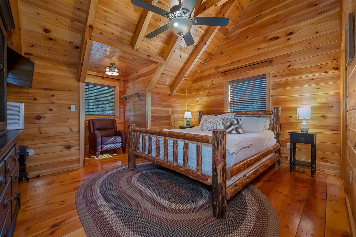 Primary bedroom upstairs with king bed full bathroom