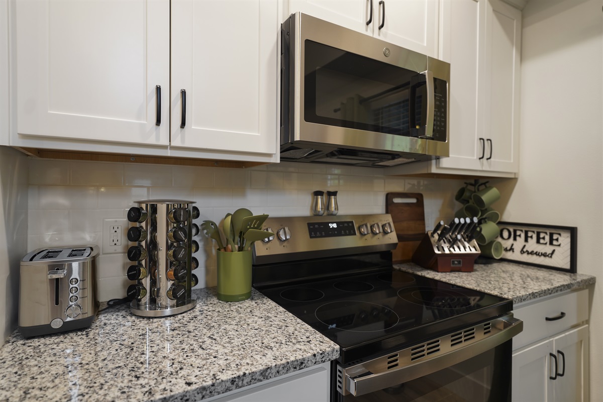 Appliances, spices, knives and all the things you need to prepare a meal together