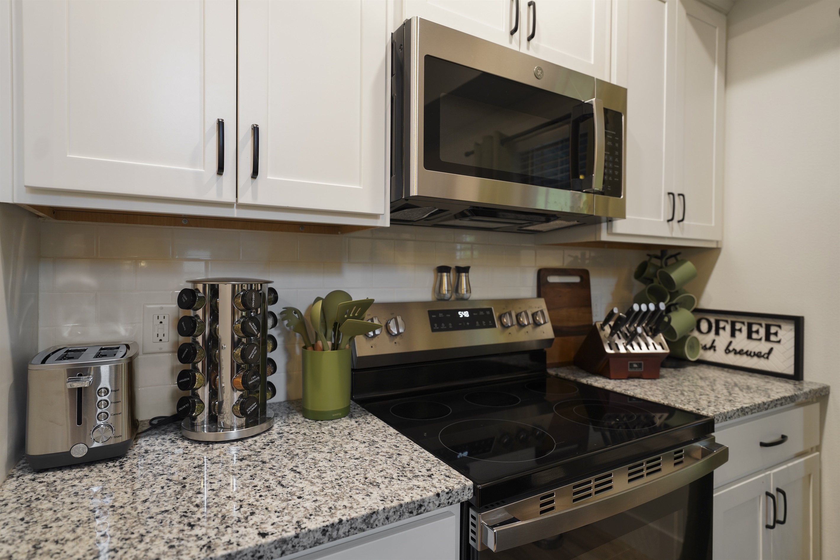 Appliances, spices, knives and all the things you need to prepare a meal together