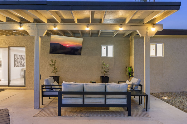Backyard living space with smart television