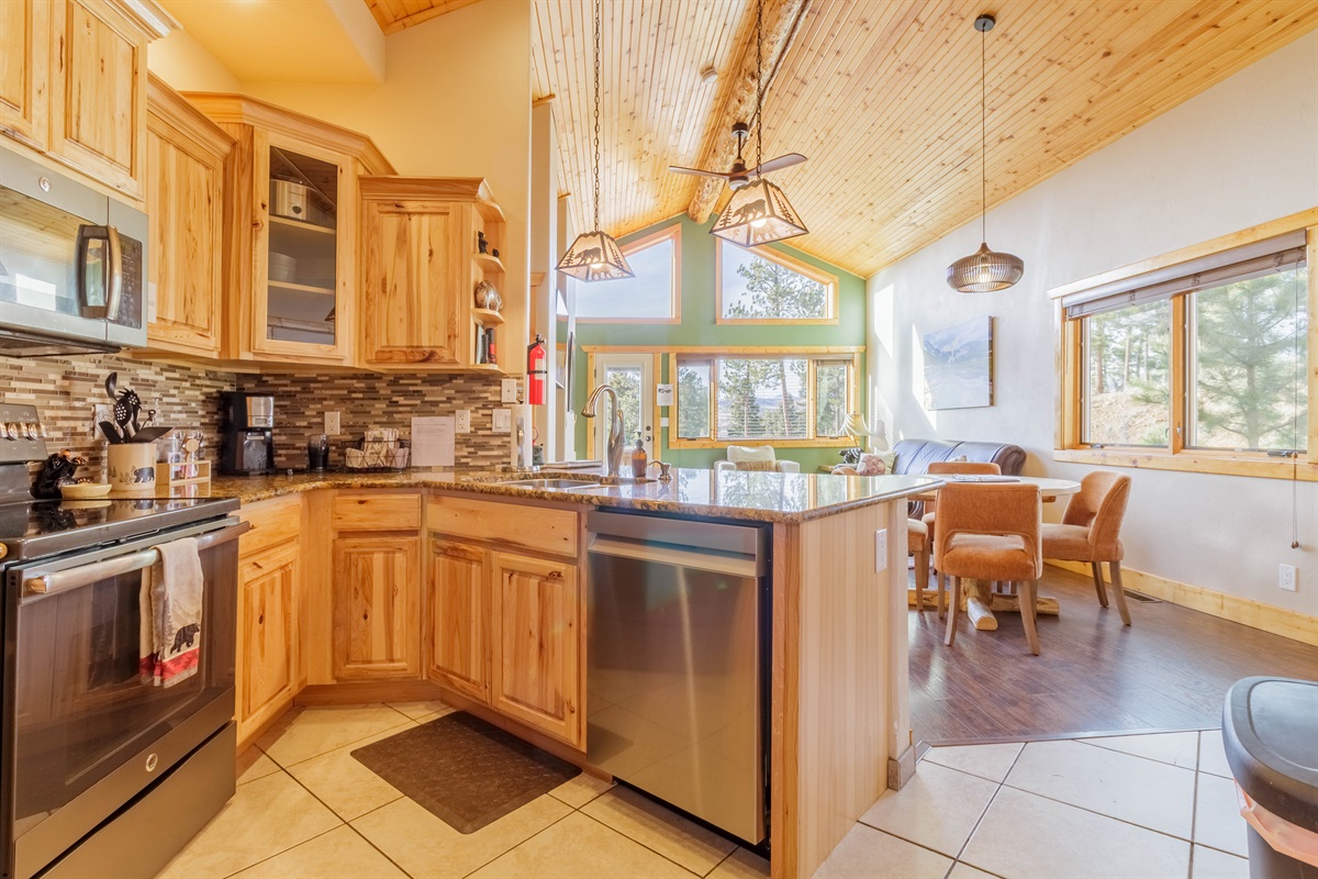 Elegant, fully-equipped kitchen and bar top for two adds a contemporary touch - featuring stainless steel finishes and all the comforts of home