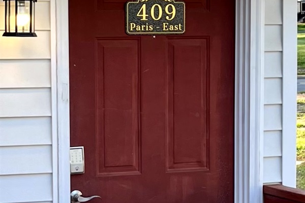 Look for the sign, and use the touchpad to unlock the door.