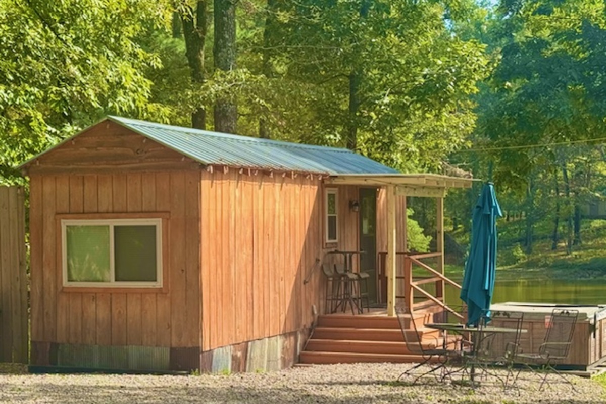 Covered front porch with lake view