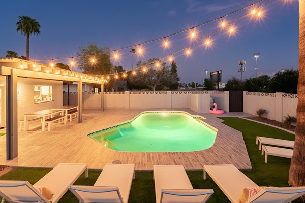 Enjoy open views of the sunset from this gorgeous backyard