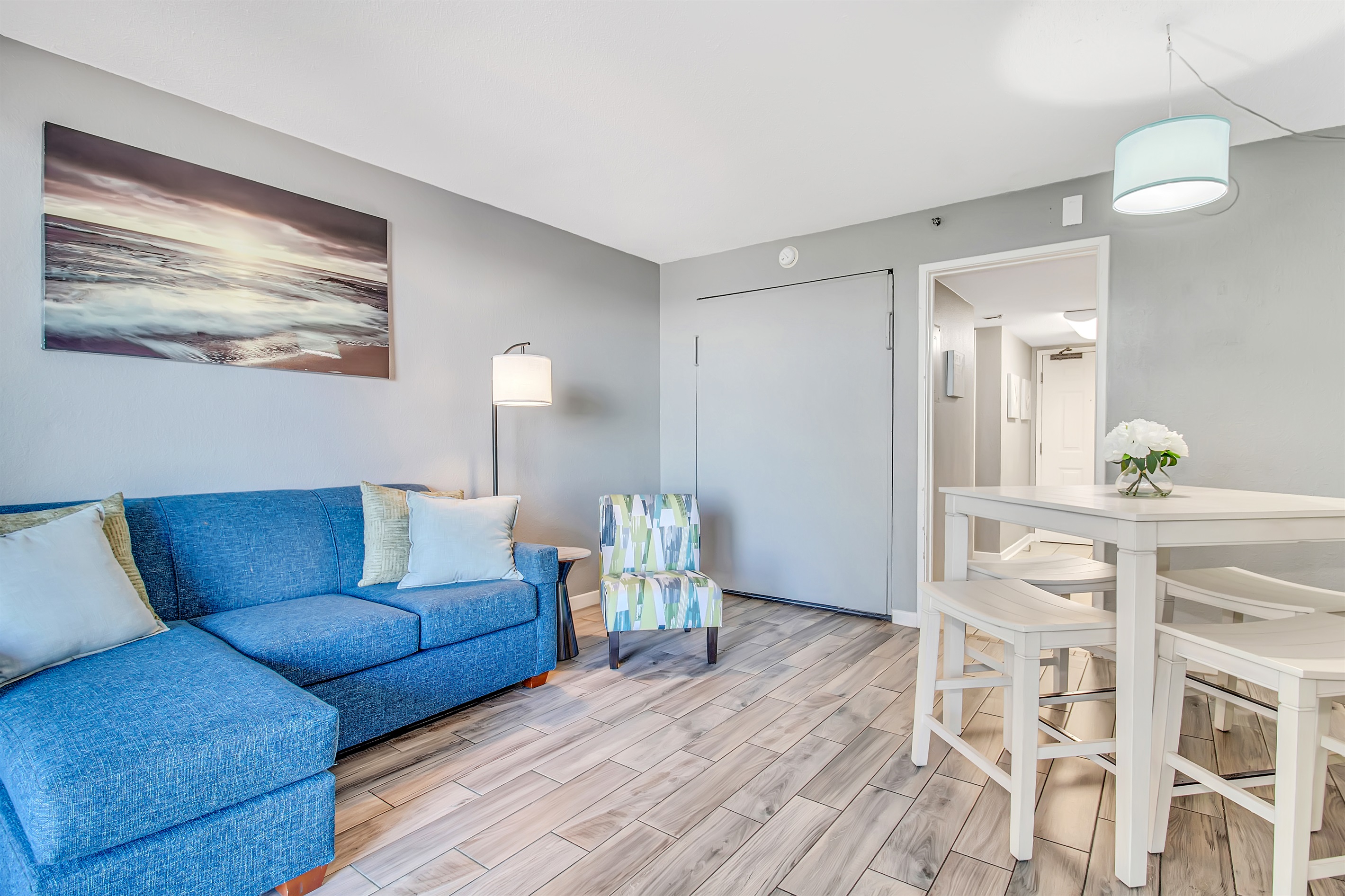 Engage in oceanview conversations from the comfort of the couch, where the living area is thoughtfully arranged to encourage socializing while savoring the sea vistas.