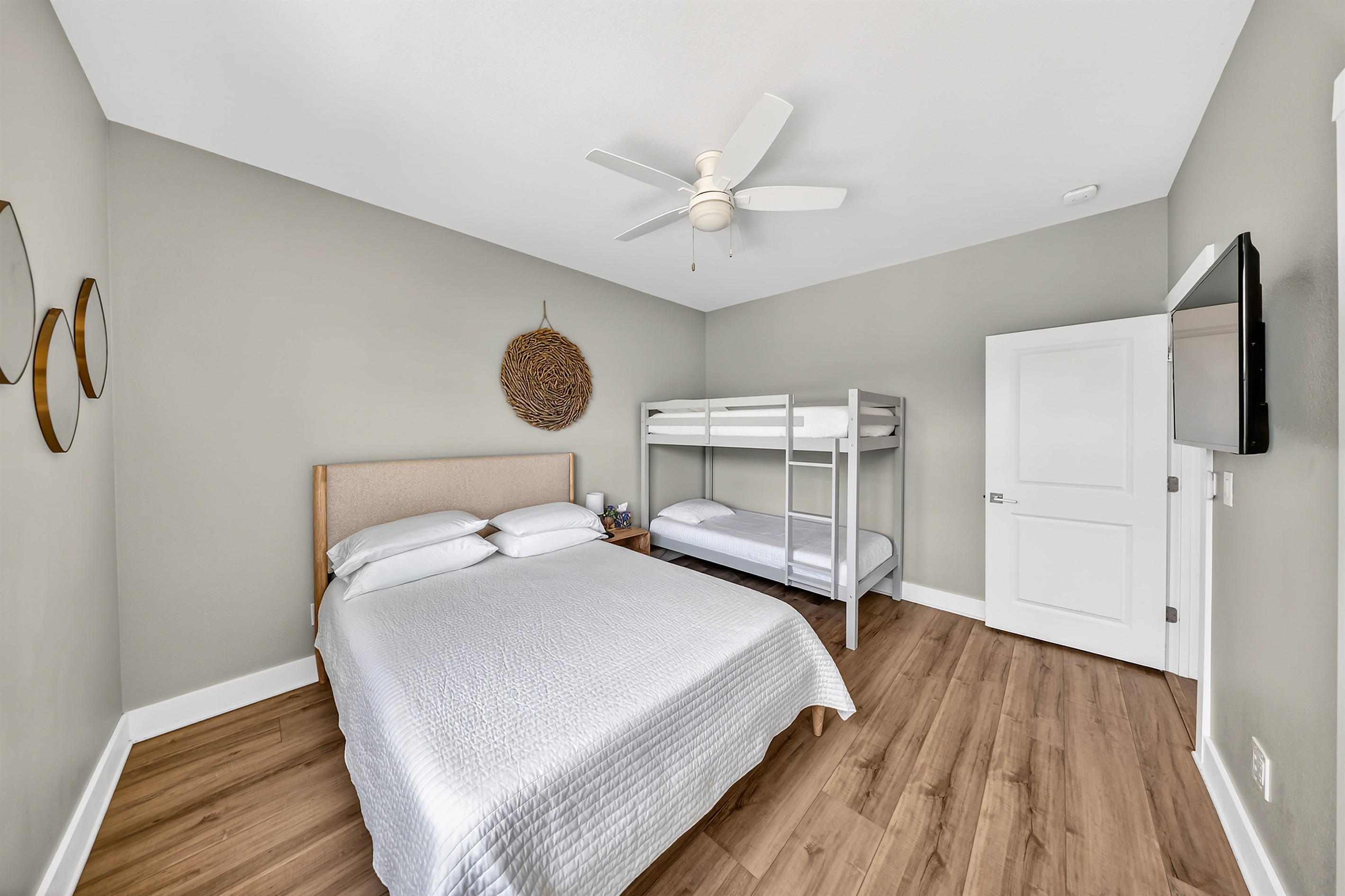 Guest room with queen bed and bunks offers comfort for families