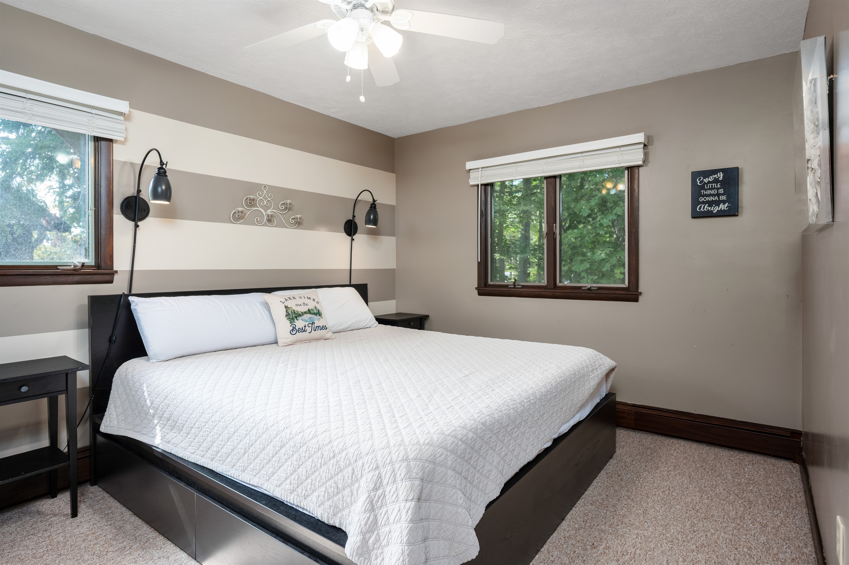 Upstairs bedroom with king bed and wooded views