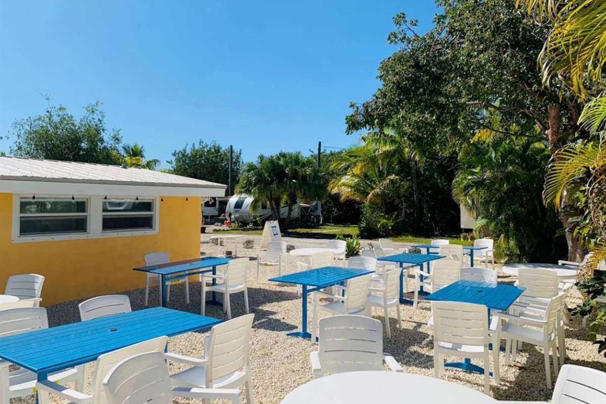 Shared outside seating. Park laundry & bathroom building.