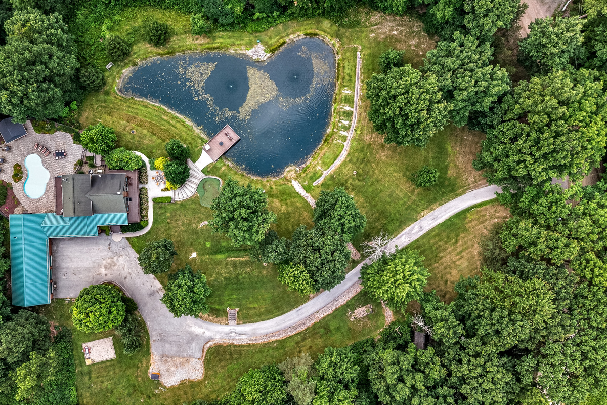 Aerial view of the pond and house