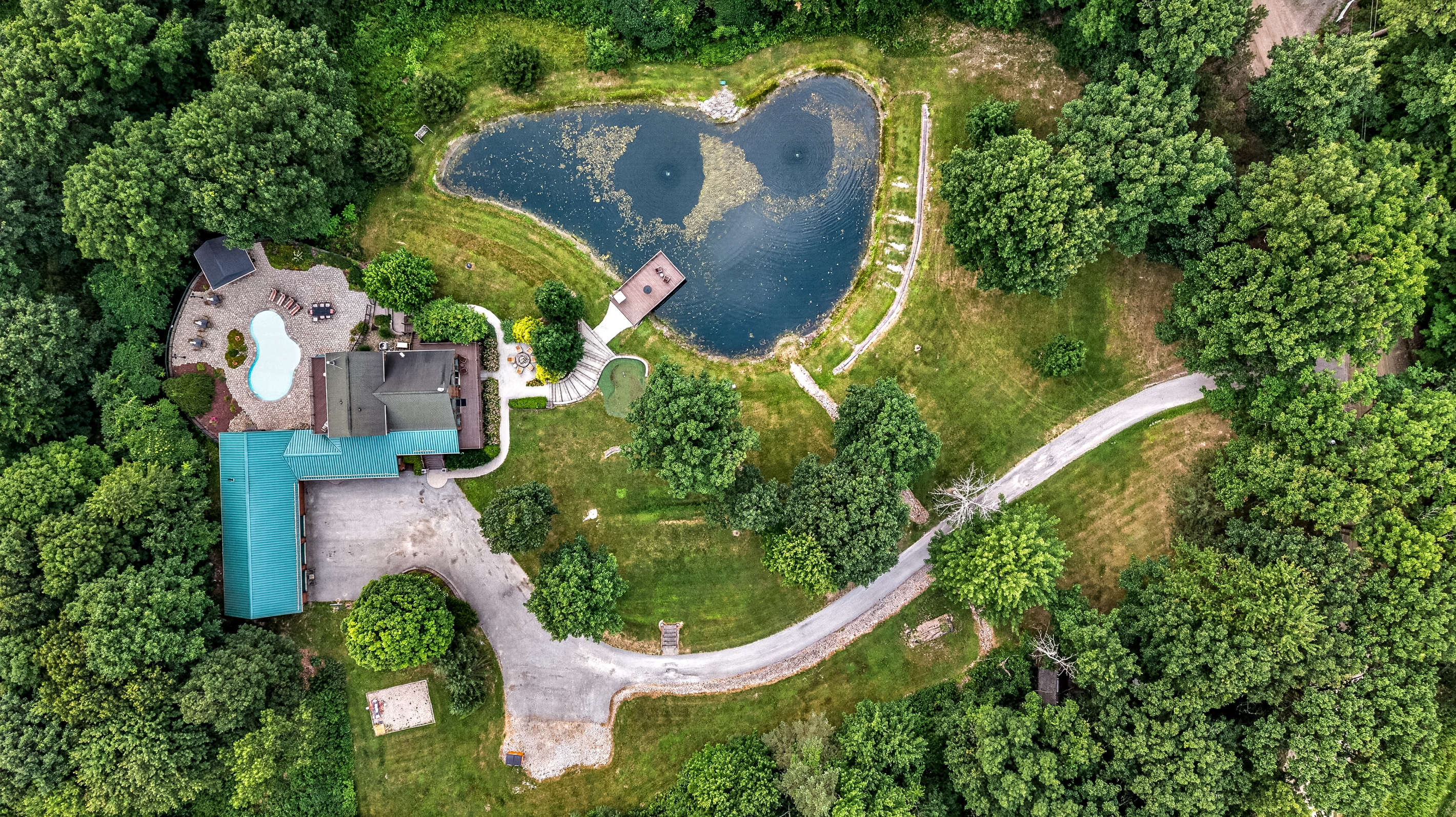 Aerial view of the pond and house