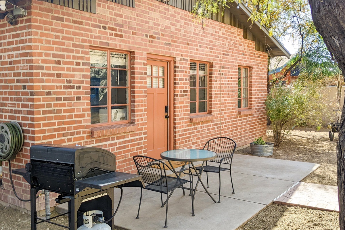 Exterior view, entrance, patio, outside dining area and grill