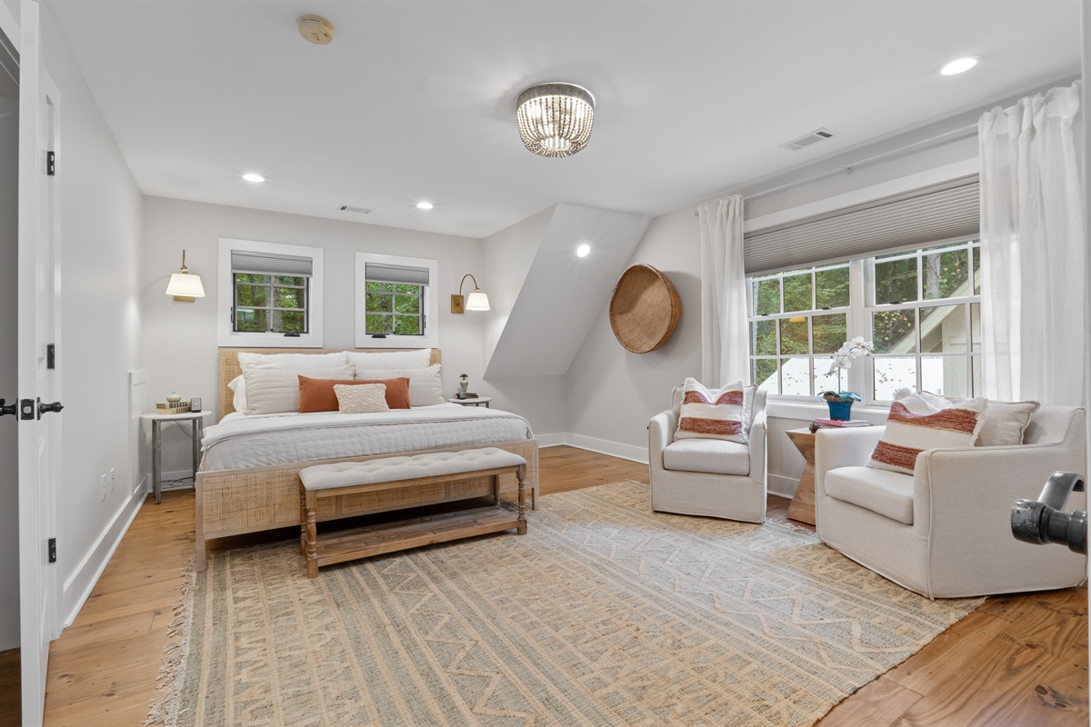 Enjoy updated décor throughout the home, featuring modern touches and a warm, inviting lakehouse style.