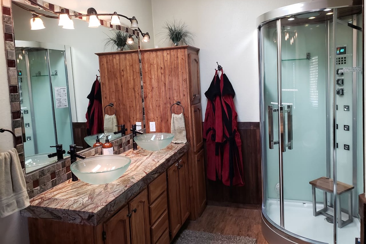 MBA with Steam shower with LED chromatherapy and stereo in the Master Suite, double sinks, and 2 spa robes