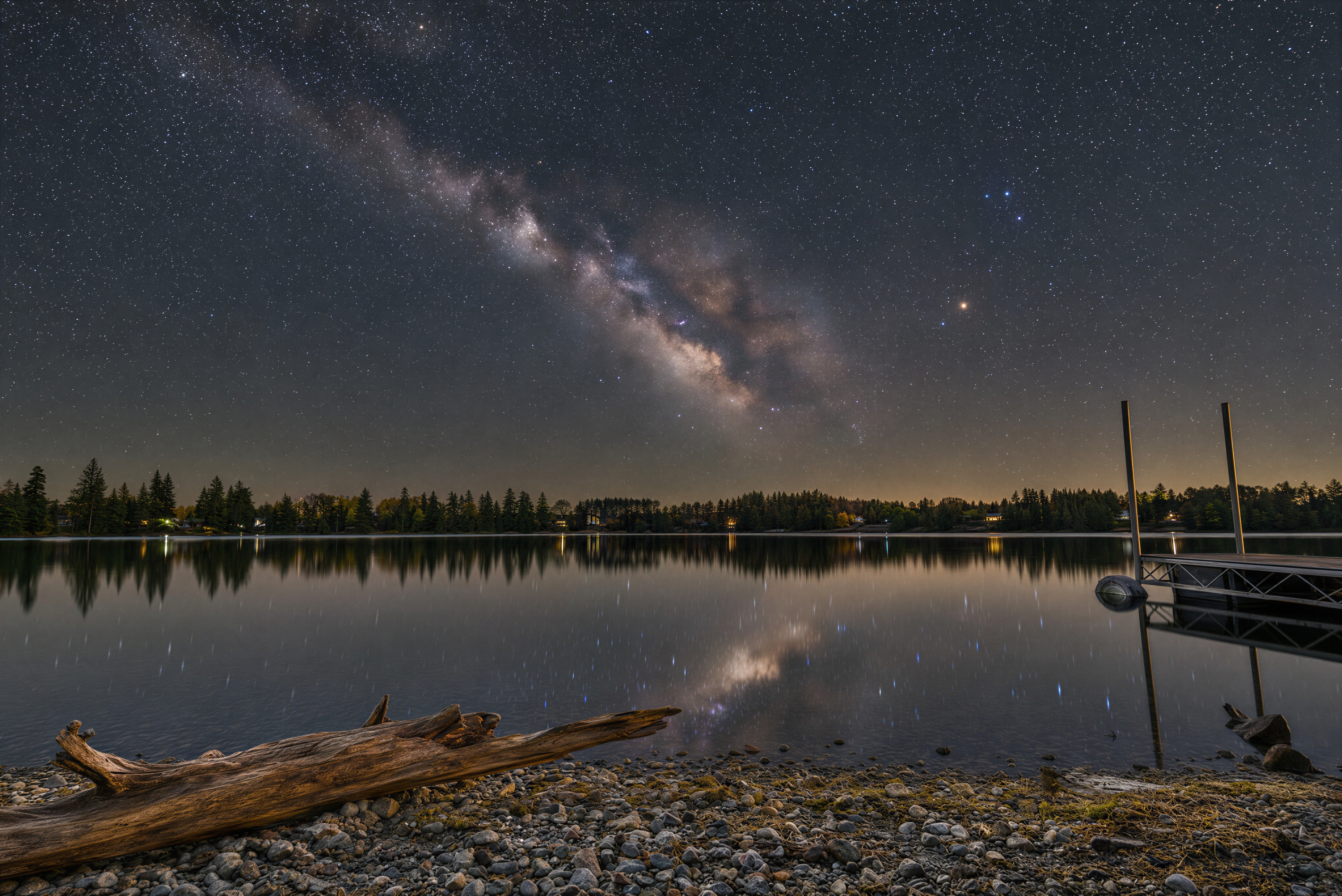 Our Bortle 2 skies (some of the darkest skies in the country) are an astrophotographer's dream: long-exposure Milky Way Core astrophotography captured from the property dock on a clear night
