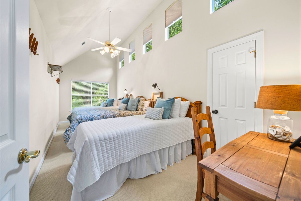 A cozy room with playful charm and tall ceilings &mdash; a favorite for kids or guests.